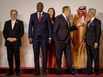 Russia's Sergei Lavrov and Saudi Arabia's Waleed al-Khuraiji speak with India's foreign minister S Jaishankar, while Iran's FM Abbas Araqchi, South Africa's Ronald Lamola and Vietnam's deputy FM Nguyen Minh Hang also pose for a portrait at the BRICS meet in New Delhi.