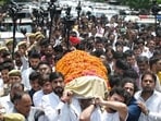 Samajwadi Party MP Aditya Yadav and others carrying the bier of Prateek Yadav, in Lucknow on Thursday. (Mushtaq Ali/HT Photo)