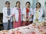 The attending doctors with Amina in Moradabad, recently (HT Photo)