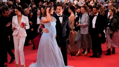 Barbara Palvin's gown featured a whimsical feathered hem that added classic Cannes drama. (AP)