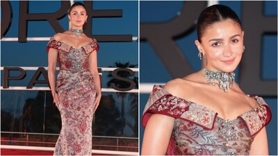 Alia Bhatt stuns at Cannes 2026 in regal floral brocade ensemble and statement jewellery. (AFP) Alia Bhatt stuns at Cannes 2026 in regal floral brocade ensemble and statement jewellery. (AFP)