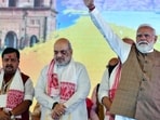 Prime Minister Narendra Modi waves during the swearing-in ceremony of the new Assam government in Guwahati on Tuesday. Union Home Minister Amit Shah and BJP National President Nitin Nabin also president. (ANI) Prime Minister Narendra Modi waves during the swearing-in ceremony of the new Assam government in Guwahati on Tuesday. Union Home Minister Amit Shah and BJP National President Nitin Nabin also president. (ANI)