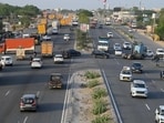 Restrictions on heavy vehicles remain on the stretch between Panchgaon Chowk and IMT Chowk due to ongoing construction work of an elevated flyover near Bhisham Das Mandir. (Parveen Kumar/HT PHOTO)