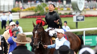 Jockey Jose Ortiz celebrates in the winners circle after riding Golden Tempo #19 to win the 152th Kentucky Derby at Churchill Downs (Getty Images via AFP)