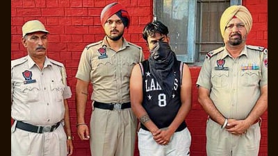 The accused in police custody on Saturday. (HT Photo)