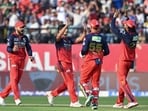 For RCB, Rasikh Salam took three wickets.