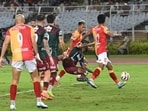 Players in action in action during ISL match between Mohun Bagan and East Bengal at Salt Lake Stadium in Kolkata. (Samir Jana/HT)