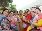 Women after casting their votes in Kullu on Sunday. (Aqil Khan /HT)