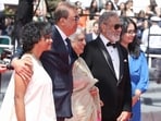 Indian filmmaker and producer Shivendra Singh Dungarpur (2L), Indian film editor Bina Paul (C) and Indian actor Joy Mathew (2R) pose as they arrive for the screening of the film "Amma Ariyan" (Report to your Mother) at the 79th edition of the Cannes Film Festival in Cannes, southern France on May 16, 2026. (Photo by Thibaud MORITZ / AFP) Indian filmmaker and producer Shivendra Singh Dungarpur (2L), Indian film editor Bina Paul (C) and Indian actor Joy Mathew (2R) pose as they arrive for the screening of the film "Amma Ariyan" (Report to your Mother) at the 79th edition of the Cannes Film Festival in Cannes, southern France on May 16, 2026. (Photo by Thibaud MORITZ / AFP)