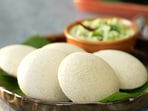 Foxtail millet, a nutritious ancient grain from India, is rich in fiber and protein. This recipe by chef Sanjeev Kapoor showcases its use in idlis, combining it with urad dal and fenugreek seeds for a healthy meal option served with coconut chutney.
