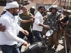 A massive demolition drive took place outside the Civil Court in Kaiserbagh. Under High Court orders, the Municipal Corporation used bulldozers to demolish over 100 unauthorized lawyers' chambers and shops. The action sparked significant protests and clashes between lawyers and local police in Lucknow, on Sunday. (Deepak Gupta/HT)