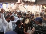 The demolition drive was carried out by Lucknow Municipal Corporation outside district court in Qaiserbagh on May 17. (HT file)