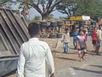 A container-truck rammed into a smaller truck transporting a wedding party on the Mumbai-Ahmedabad highway, in Palghar on Monday morning.