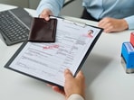 The US has started releasing F-1 student visa slots, which are disappearing quickly, causing stress for students.