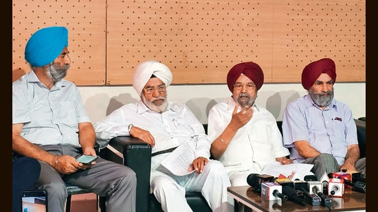 Justice Nirmal Singh (retd, second from right) addressing the media in Chandigarh on Monday. (HT)