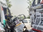 Damaged remains of vehicles after a collision between a van and a truck in Lakhimpur Kheri district on Monday. (PTI PHOTO) Damaged remains of vehicles after a collision between a van and a truck in Lakhimpur Kheri district on Monday. (PTI PHOTO)