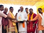 Deputy chief minister Brajesh Pathak at a bahndara held in Lucknow (HT Photo)