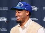 Seattle Seahawks wide receiver Jaxon Smith-Njigba smiles during an NFL football news conference on March 25.