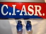The hand grenades recovered from the duo’s possession. (HT)