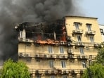 Thick black smoke coming out of the hotel in Civil Lines on Monday. (ANIL KUMAR MAURYA/HT)