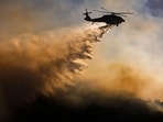 Sandy fire cause: A brush fire near Simi Valley has burned 1,385 acres with 5% containment. Over 10,000 homes evacuated, and schools closed as officials investigate the cause.
