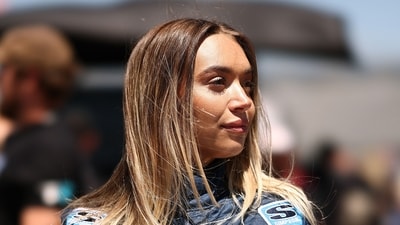 Natalie Decker, driver of the Nico's Bagels & Brunch Ford, looks on during the NASCAR Craftsman Truck Series ECOSAVE 200 on May 15. (Getty Images via AFP) Natalie Decker, driver of the Nico's Bagels & Brunch Ford, looks on during the NASCAR Craftsman Truck Series ECOSAVE 200 on May 15. (Getty Images via AFP)