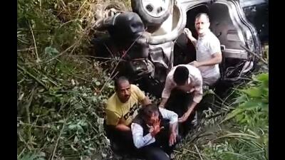 One person dead and four person injured as a car plunged into deep gorge near Sadhu Pul in Kandaghat area of Solan on Tuesday. (HT Photo)