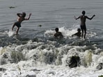 Boys bathe in the Gomti to beat the heat near Kudia Ghat in Lucknow. (HT Photo) Boys bathe in the Gomti to beat the heat near Kudia Ghat in Lucknow. (HT Photo)
