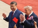 US President Donald Trump participates in a welcome ceremony with China's President Xi Jinping at the Great Hall of the People, Thursday, May 14, 2026, in Beijing.