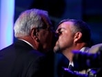 US Rep. Barney Frank (D-MA) (L) kisses his husband Jim Ready as he leaves the stage after addressing the final session of the Democratic National Convention in Charlotte, North Carolina September 6, 2012. 