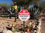 New chains, signs and barriers have been added outside Nancy Guthrie’s Tucson property. 