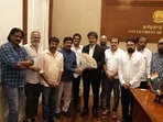 CM Vijay received a bouquet of flowers from the directors' union.