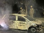 The incident is suspected to have been caused by engine overheating while two people were travelling in the car, said an official. (HT Photo)
