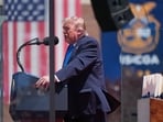 President Donald Trump speaks during the commencement address at the US Coast Guard Academy, in New London.