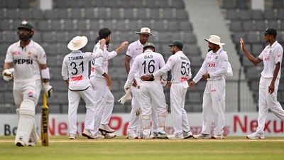 Bangladesh�s players celebrate after the dismissal of Pakistan�s Sajid Khan (L) during the fifth day of the second Test cricket match between Bangladesh and Pakistan at the Sylhet International Cricket Stadium in Sylhet on May 20, 2026. (Photo by MUNIR UZ ZAMAN / AFP) (AFP)