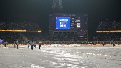 An hour-long rain delay stopped proceedings after the 8th over of MI's innings, with the team struggling. However, it wasn't likely to get much better. (PTI) An hour-long rain delay stopped proceedings after the 8th over of MI's innings, with the team struggling. However, it wasn't likely to get much better. (PTI)