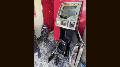 The damaged Axis Bank ATM at Nooranwala Road in Ludhiana on Wednesday. (Manish/HT)