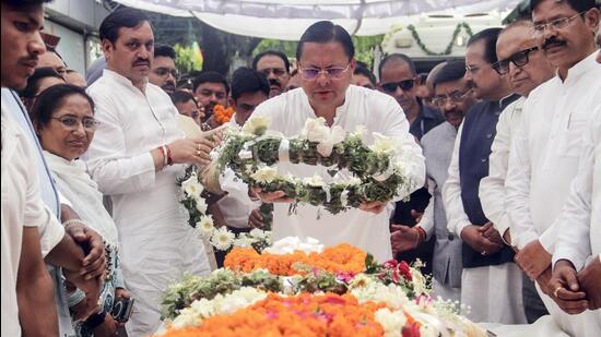Army and police personnel presented a guard of honour as the veteran leader was given a final farewell. (PTI)