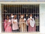 Falta repolling today LIVE: Voters stand in queues and show their voter IDs at a polling station to cast their votes for the re-election to the Falta assembly seat, in South 24 Parganas on Thursday.