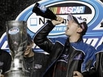 Kyle Busch drinks champagne after winning the Nationwide series championship and the NASCAR Ford 300 Nationwide series Kyle Busch drinks champagne after winning the Nationwide series championship and the NASCAR Ford 300 Nationwide series