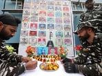 Central Reserve Police Force (CRPF) personnel pay tribute to the martyrs, on the eve of the second anniversary of Pulwama attack, in Jammu, 