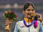 Parul Chaudhary poses during the presentation ceremony of the 5000m event at the Hangzhou Asian Games. (PTI) Parul Chaudhary poses during the presentation ceremony of the 5000m event at the Hangzhou Asian Games. (PTI)