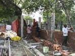 Shops under construction along the footpath in Ashiana, as part of the vending zone project by LMC. (Deepak Gupta/HT)
