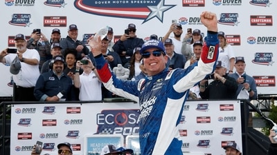 Kyle Busch, driver of the #7 HendrickCars.com Chevrolet, celebrates in victory lane after winning the NASCAR Craftsman Truck Series (Getty Images via AFP) Kyle Busch, driver of the #7 HendrickCars.com Chevrolet, celebrates in victory lane after winning the NASCAR Craftsman Truck Series (Getty Images via AFP)