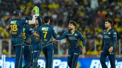 The win was sealed with Rashid taking three wickets and Kagiso Rabada also taking three of his own, as the GT bowling continues to hum. They take a massive NRR jump, crucial to sealing the top two, leaving a lot for SRH to do against RCB tomorrow night. (PTI) The win was sealed with Rashid taking three wickets and Kagiso Rabada also taking three of his own, as the GT bowling continues to hum. They take a massive NRR jump, crucial to sealing the top two, leaving a lot for SRH to do against RCB tomorrow night. (PTI)