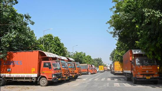 A view of trucks parked at Transport Nagar in Noida’s Sector 67 on Thursday. (Sunil Ghosh/HT Photo)