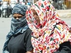 Women cover themselves with scarves to beat the scorching heat, in Kanpur on Thursday. Women cover themselves with scarves to beat the scorching heat, in Kanpur on Thursday.