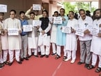 Congress MLas stage a protest during the second day of the Assam assembly session in Guwahati on Friday. (PTI) Congress MLas stage a protest during the second day of the Assam assembly session in Guwahati on Friday. (PTI)