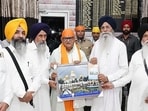 Punjab governor Gulab Chand Kataria with SGPC chief Harjinder Singh Dhami in Ludhiana on Thursday. (HT Photo) Punjab governor Gulab Chand Kataria with SGPC chief Harjinder Singh Dhami in Ludhiana on Thursday. (HT Photo)