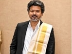 Vijay received a cricket bat signed by Virat Kohli as a gift. 